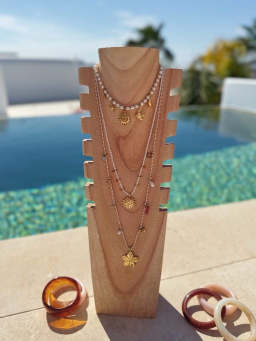 Sautoir avec des petites pierres blanches soleil